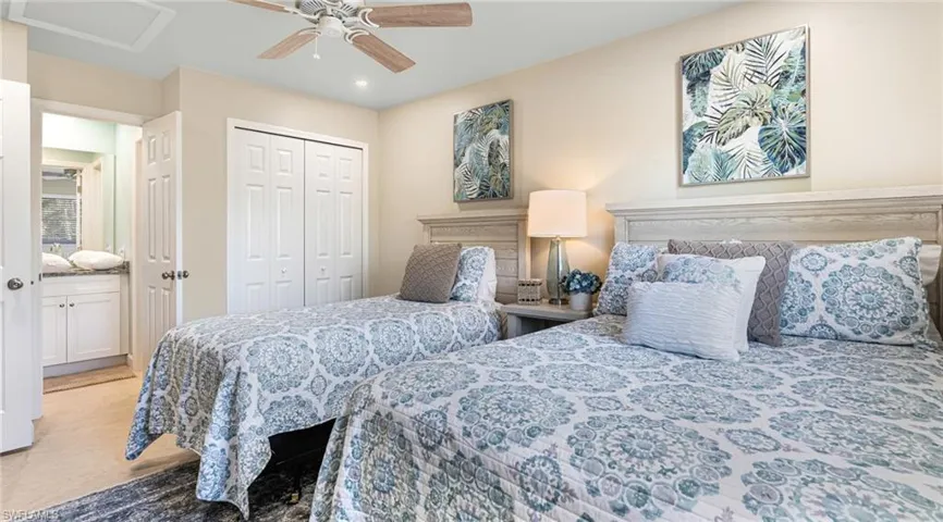 Bedroom with a closet and ceiling fan