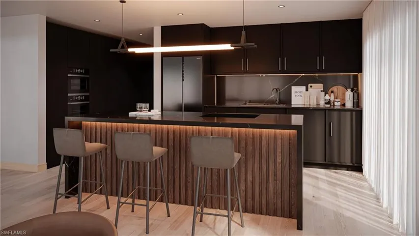 Bar with modern cabinets, dark cabinetry, stainless steel refrigerator, and decorative light fixtures