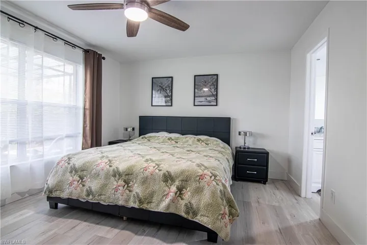 Bedroom featuring light wood-style floors and ceiling fan