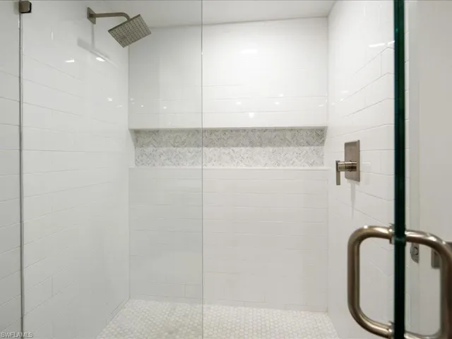 Bathroom featuring a walk in shower