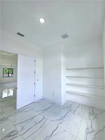 View of tiled spare room