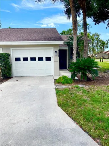 Single story home featuring a garage