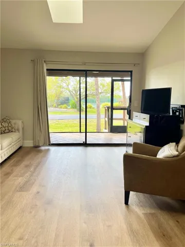 Living room featuring hardwood / wood-style flooring
