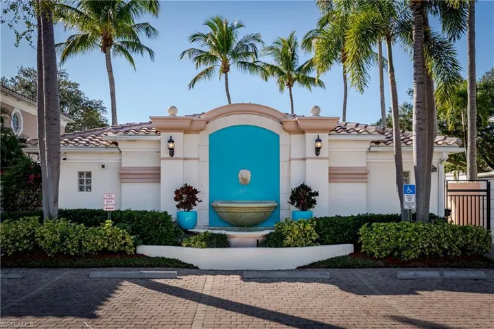 Community room with gate leading to pool