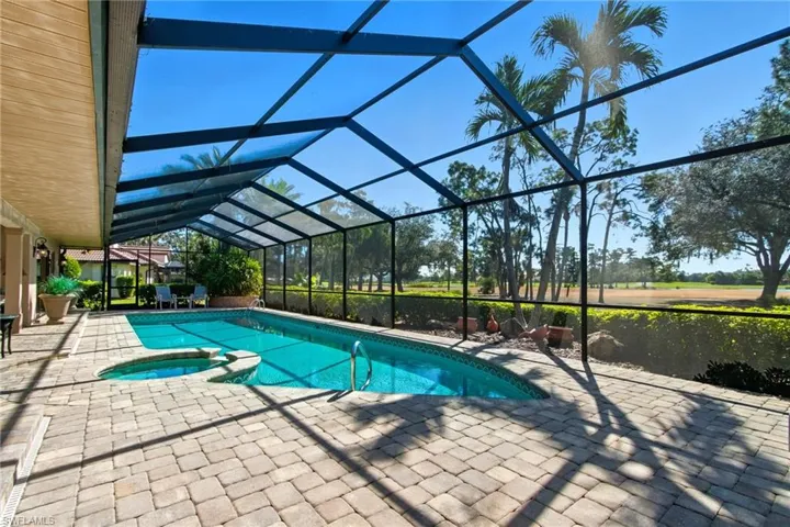 Large pool area with golf course views.
