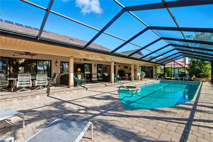 Fabulous lanai area with large pool and spa, plenty of under cover entertaining area.