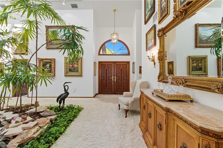 Welcoming entry with double entry door, vaulted ceilings and lots of natural light.