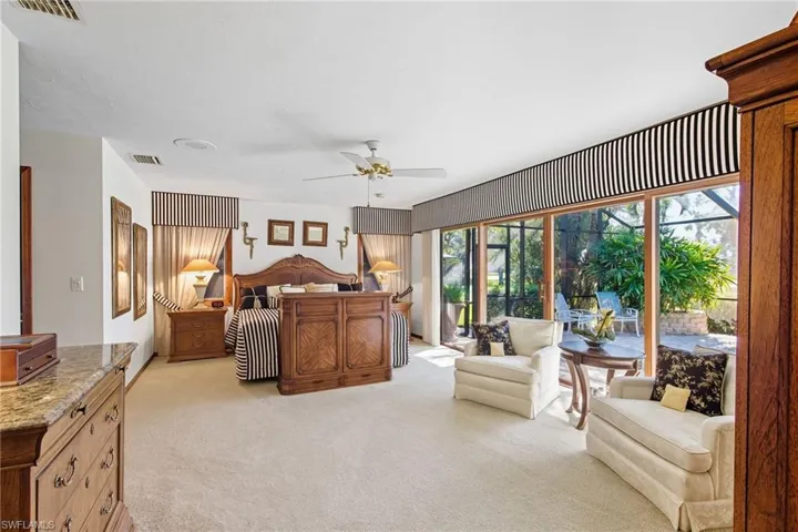 Owner's suite has dual walk-in closets, large bath, great views.