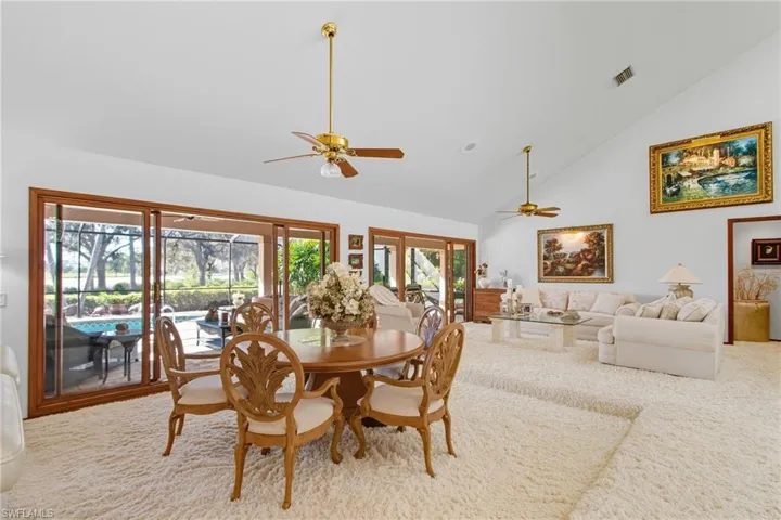 The living/dining combo is light, bright and open and have sliding glass doors out to the lanai.