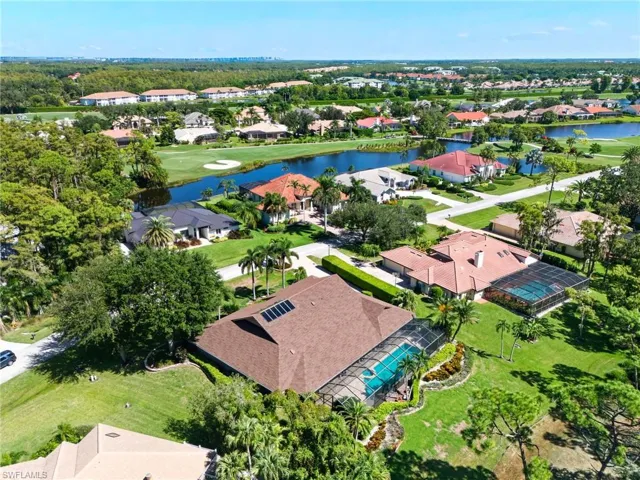 Aerial perspective featuring a large body of water and a golf course