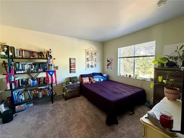 Bedroom featuring carpet