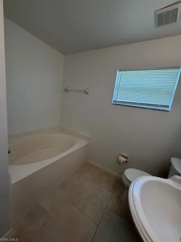 Soaking tub with a tiled surround