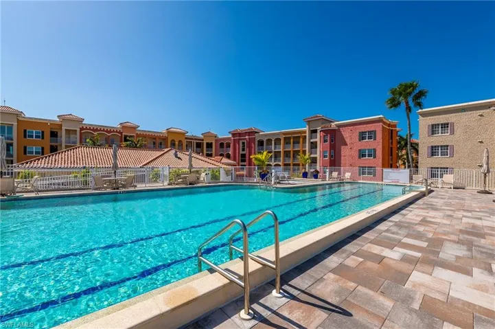Community pool featuring a patio area