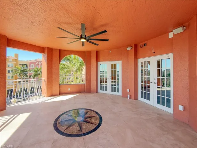 View of patio / terrace featuring french doors and ceiling fan