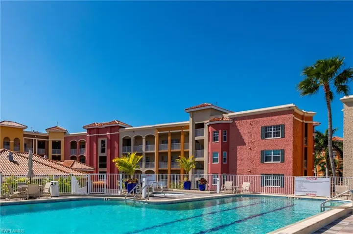 Community pool featuring a patio area