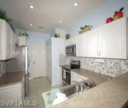 7496  Berkshire Pines  DR, Naples, FL 34104