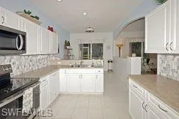 7496  Berkshire Pines  DR, Naples, FL 34104