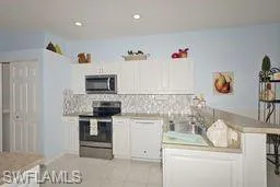 7496  Berkshire Pines  DR, Naples, FL 34104