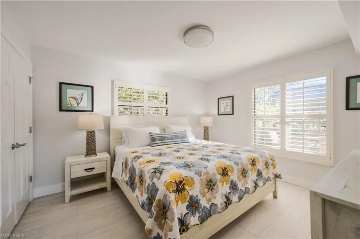 Bedroom with multiple windows
