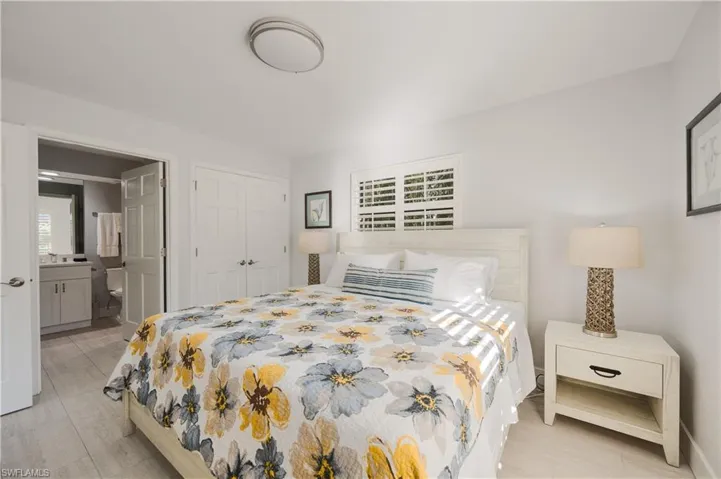 Bedroom featuring a closet and ensuite bathroom