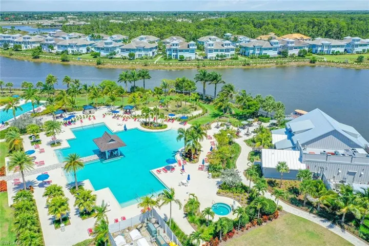 Amenities include a resort style pool and waterfront restaurant.
