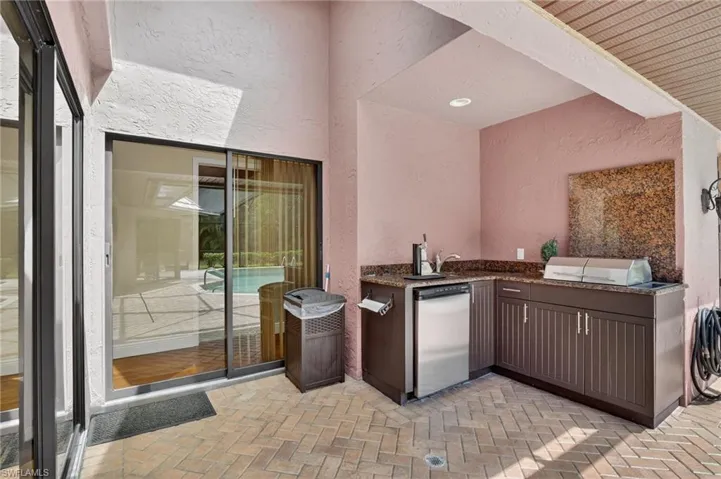 View of patio with an outdoor kitchen