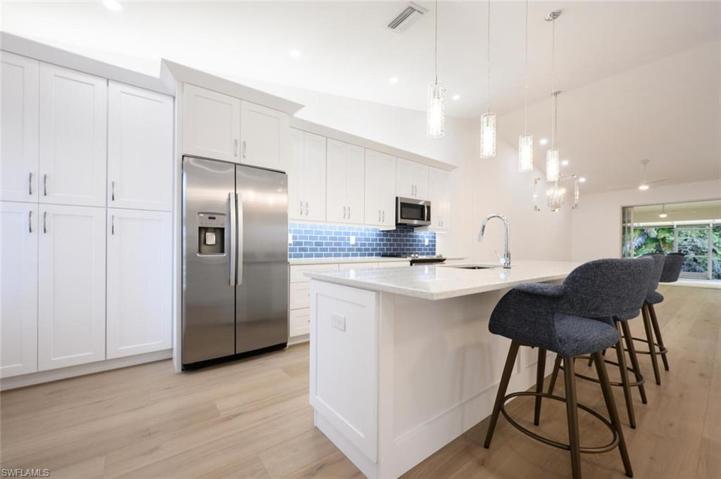 Custom Soft Close Cabinets with under and above cabinet lighting