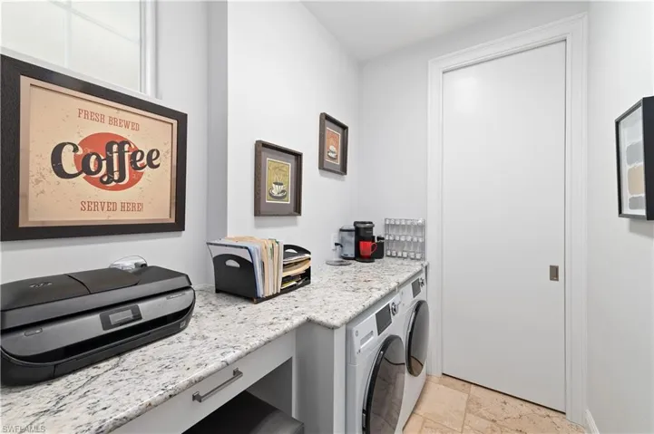 Laundry area with washer / dryer