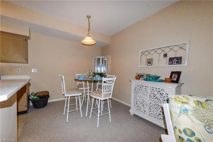 View of carpeted dining space