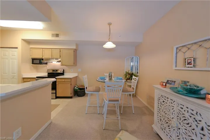 View of carpeted dining area