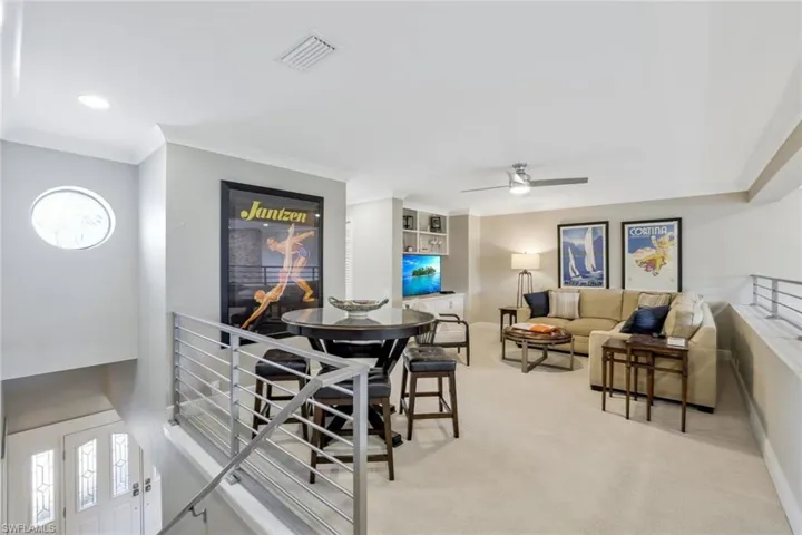 Second Floor Loft with Custom Aluminum Railings, New Berber Carpet, New Build In, Sectional Game Table