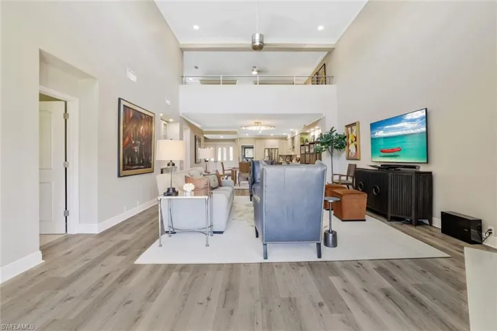Long View Showing the Raised Ceiling and Loft with New Custom Aluminum Railing, Crown Molding, New Fixtures