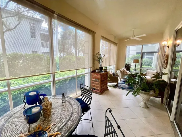 Sunroom featuring tile patterned flooring