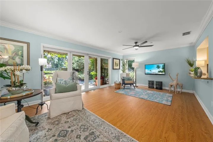 Family room with Impact Glass windows and doors