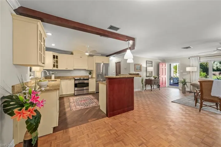 Open kitchen with stainless steel appliances