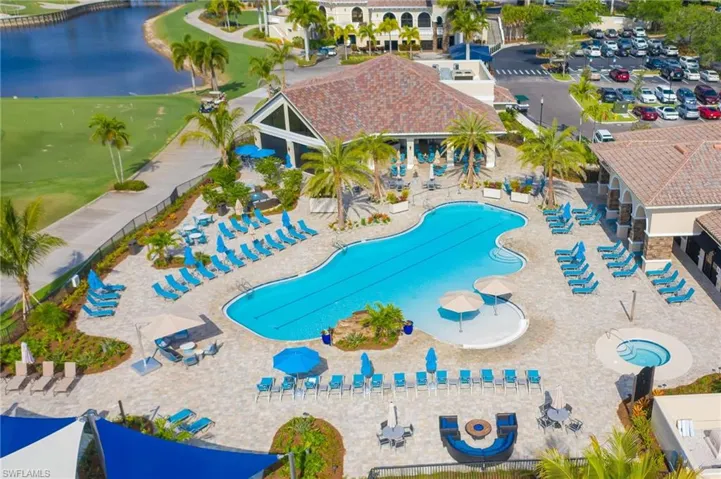View of pool with a water view