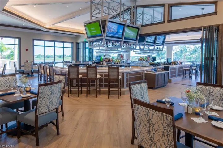 Dining area with recessed lighting and a wealth of natural light