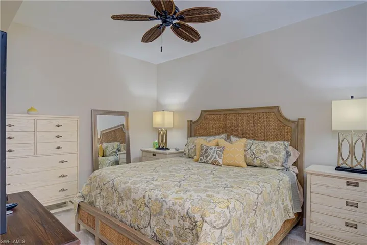 Bedroom with carpet floors and a ceiling fan