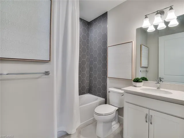 Bath 2 - Photos are from the furnished model. Options for this home may vary