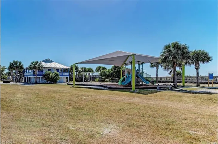 View of jungle gym featuring a yard