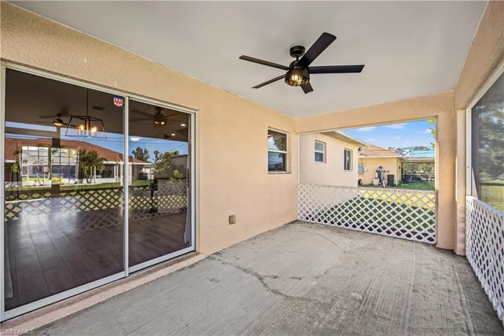 View of patio featuring ceiling fan