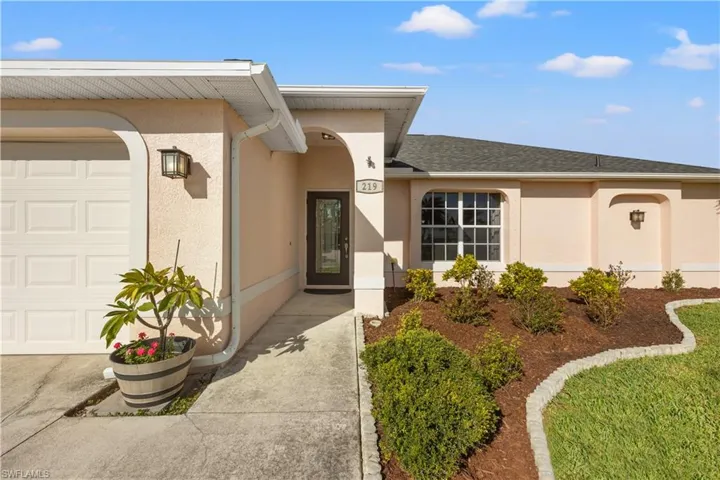 Entrance to property with a garage