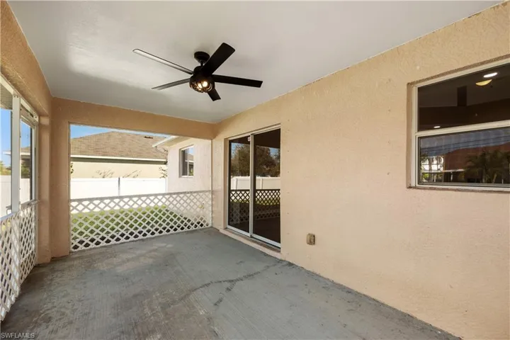 View of patio with ceiling fan
