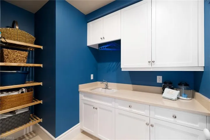 laundry room with sink