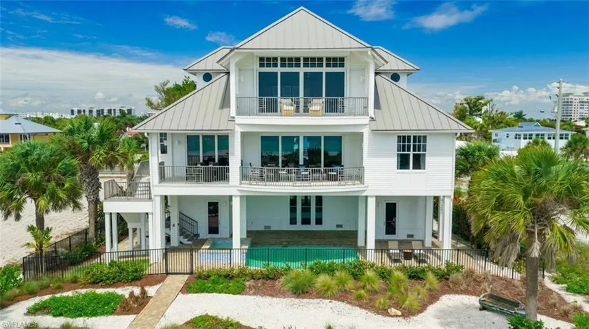 back of the house with decks and pool