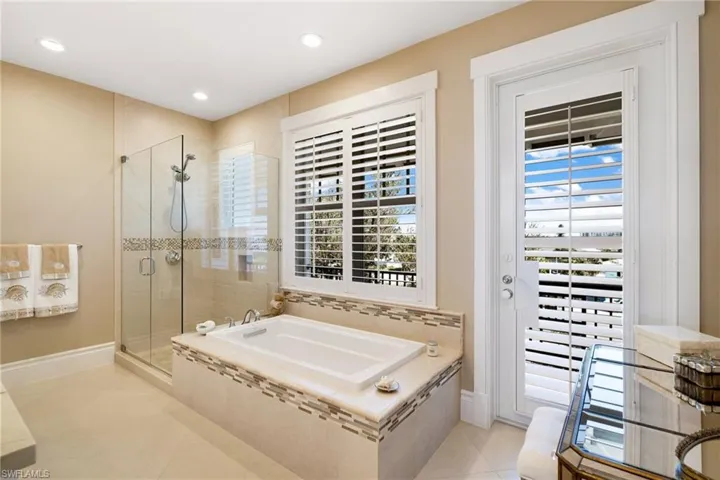 Primary bath with front balcony