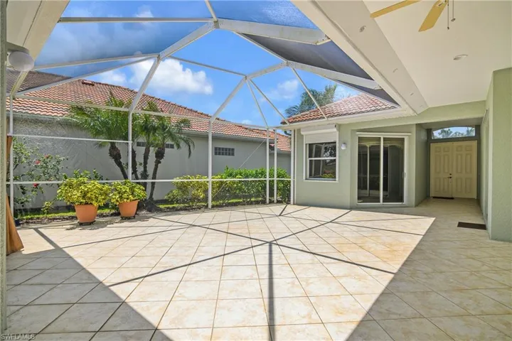 Enter this beautiful home via the Courtyard--Relax and unwind outdoors on your spacious courtyard lanai, perfect for gatherings or casual dinners.