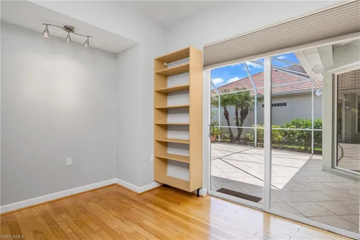 Office with slider entry to courtyard.