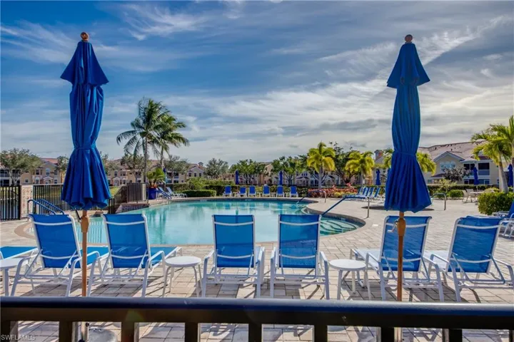 Community pool featuring a patio area