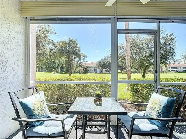 Sunroom / solarium featuring plenty of natural light and ceiling fan